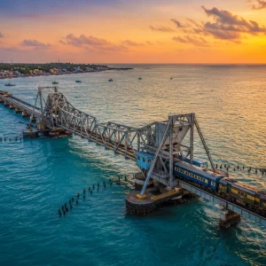 Pamban Railway Bridge over the ocean at sunset in Rameshwaram, Tamil Nadu, India.